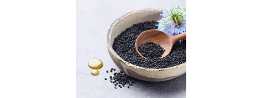 Black seed oil bottle with Nigella sativa seeds for everyday wellness