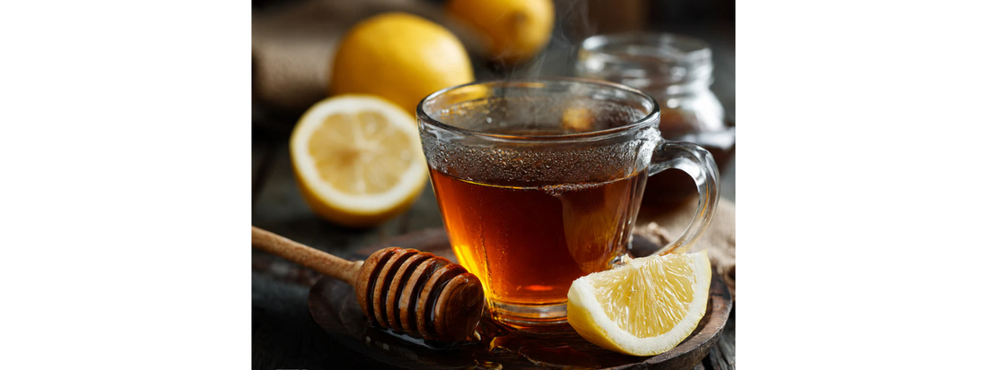 Warm tea with lemon, ginger and honey as part of a seasonal wellness routine for immune support