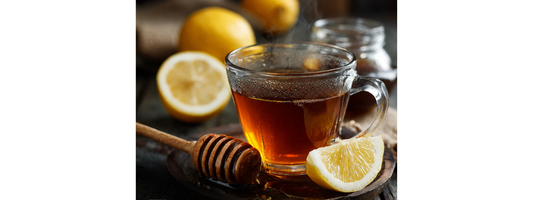 Warm tea with lemon, ginger and honey as part of a seasonal wellness routine for immune support